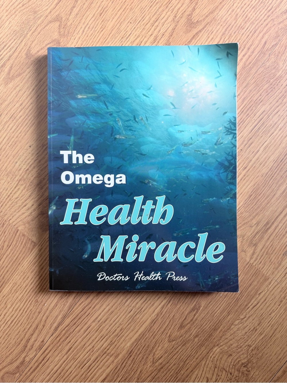 The Omega Health Miracle Book Teal/Blue Cover
